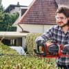 Einhell GE-PH 2555A Petrol Hedge Trimmer 55cm 0.85kW -HomeTool Haven EINGEPH2555A INUSE1