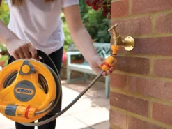 Hozelock Micro Hose Reel + 10m Of 7mm Hose 10 Hozelock Micro Hose Reel + 10m Of 7mm Hose -HomeTool Haven HOZ2427 INUSE2